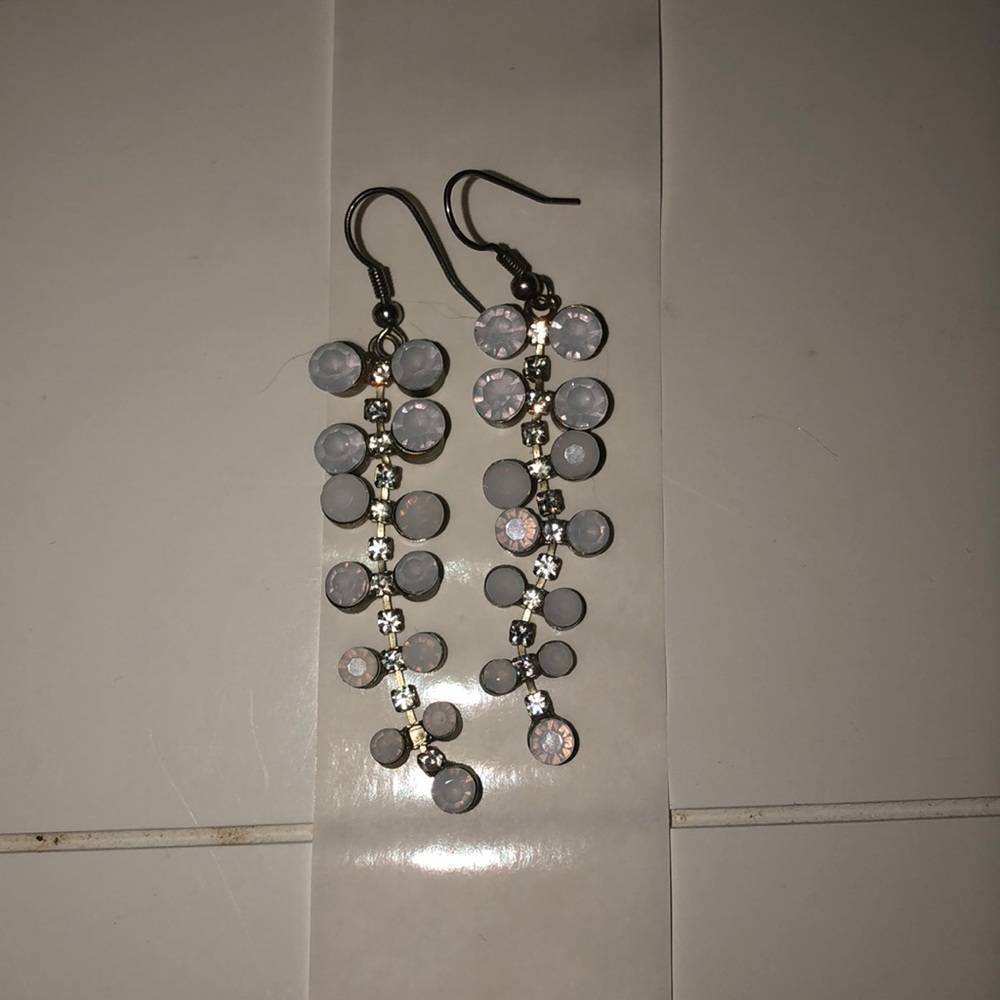 White dangle earrings